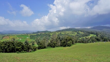 Ooty,Tamilnadu,India-June 04 2022:Tourists enjoying beautiful Wenlock Downs 9th Mile Shooting Point.