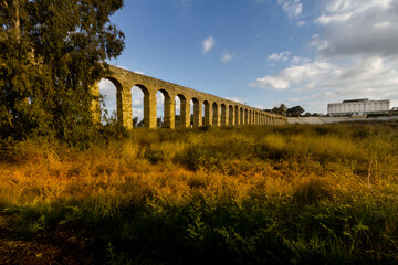 A Roman aqueduct at sunrise in Kibbutz Lohamei Haghetaot