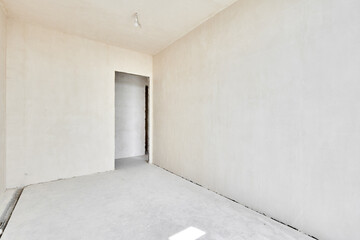 Interior of new apartment without finishing in gray tones