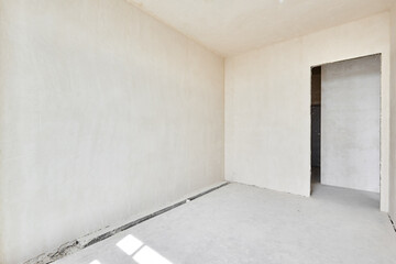 Interior of new apartment without finishing in gray tones