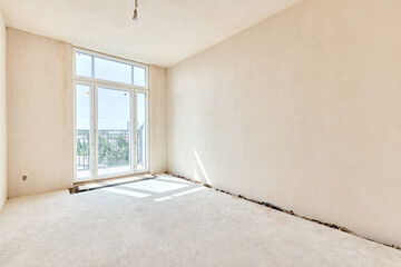 Interior of new apartment without finishing in gray tones