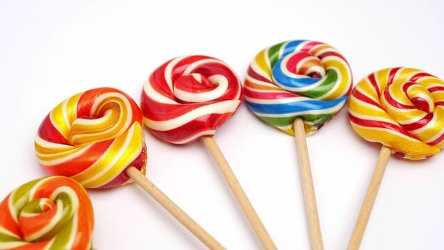 Set of colorful lollipops isolated on white. sucker and unhealthy food. rainbow lollypop. multi colored confectionery and lollipop candys background