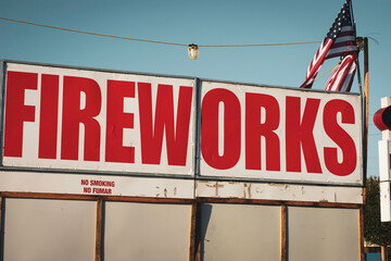 Obraz premium Fireworks stand with American flag