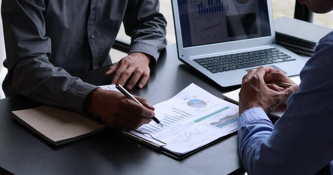 Team of Businessman working at office with documents on his desk, doing planning analyzing the financial report, business plan investment, finance analysis concept