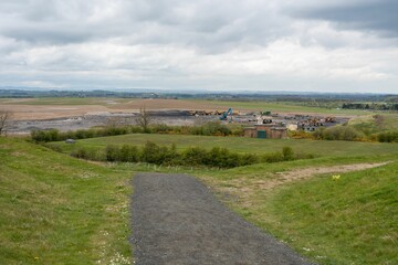 Final filling in work on the Banks opencast Shotton surface mine, viewed from Northumberlandia