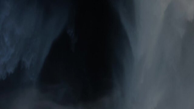 Skogafoss waterfall close up. Water falling in slow motion. One of the biggest waterfalls in Iceland. Near the ring road