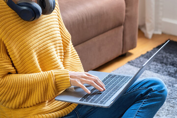 relax, de-stress, holiday, happy, Asian woman relaxing at home listening to music from smartphone and laptop happily.