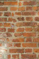 Brick red wall. Background of a old brick house.