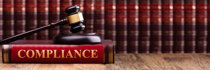 Judge Gavel And Soundboard On Compliance Law Book
