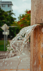 Naklejka na ściany i meble water fountain on the street