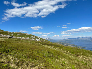 Fototapeta premium Hiking to the mountains Seterfjellet a warm and beautiful summer day, Northern Norway- Europe 