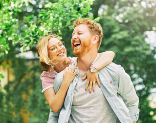 woman couple man happy happiness  love young lifestyle together romantic boyfriend girlfriend laughing hug piggyback - obrazy, fototapety, plakaty