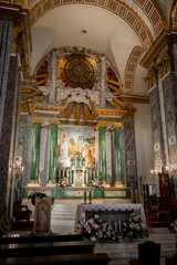 Obraz premium wooden benches in a catholic church interior
