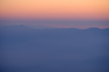a pastel sunrise or sunset in the Appalachian mountains