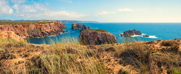 beautiful rocky coast at west algarve Portugal, near Carrapateira - obrazy, fototapety, plakaty