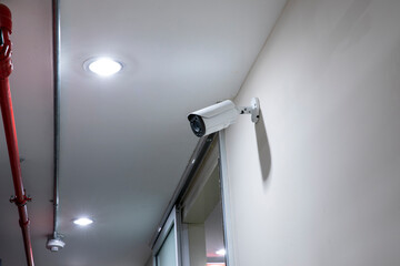 Modern CCTV camera on a wall	
