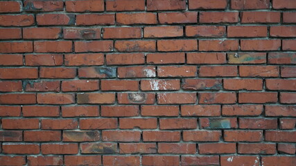 Building wall texture with old red bricks