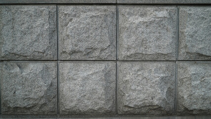 Obraz premium Rough brick surface with large square pattern