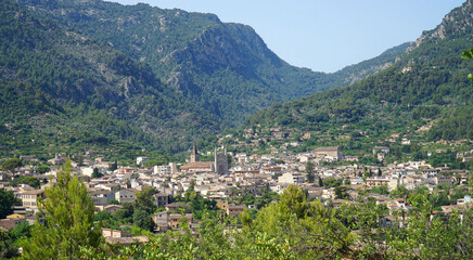 Fototapeta na wymiar View of Soller Mallorca from above with Tramuntana mountains in the background.