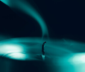 Smoke from the flame of an extinguished candle  close-up.