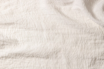 White crumpled fabric texture background. Natural organic eco textiles canvas banner background. Top view