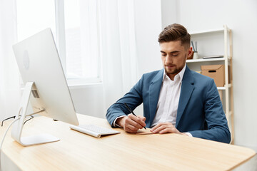 businessmen sitting at the computer work boss technologies