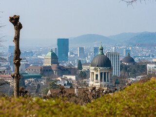 Zurich, Switzerland - March 26th 2022: Tele view from Sonnenberg towards Kreuzkirche and the city