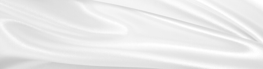 Obraz premium Smooth elegant white silk or satin luxury cloth texture as wedding background. Luxurious background design
