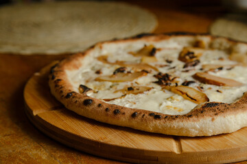 Pizza bianca on wooden table