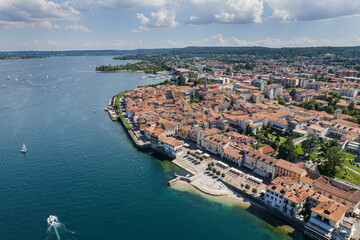 Naklejka na ściany i meble Aerial view of the city of Arona and Lake Maggiore, Italy.