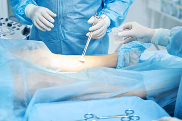 Sanitizing leg skin surface for surgical operation in hospital