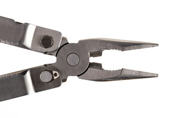 Closeup folding knife pliers multitool white background