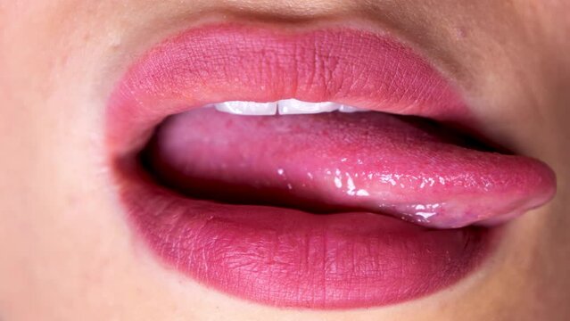 Womans licking her lips 