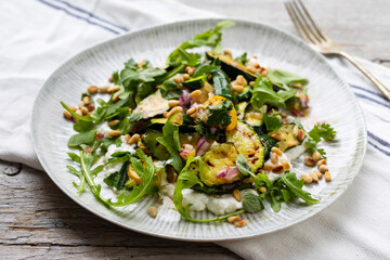 Baby courgette salad on ricotta cheese