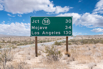 Mojave, Los Angeles and Route 58 junction highway sign on Route 14 in Southern California.  