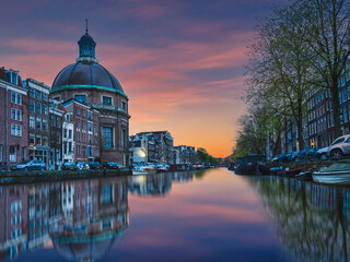 Dutch buildings on canal side in Amsterdam, Netherlands