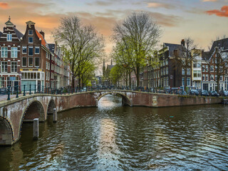 Dutch buildings, canals and bridges in Amsterdam, Netherlands
