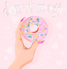 glamorous pink donut in hand on pink background