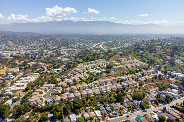 Los Angeles, California, USA – June 23, 2022: Aerial Drone View of Oak Hill Estates Townhouses with Arroyo Seco Park, South Pasadena - obrazy, fototapety, plakaty