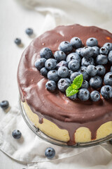 Delicious and homemade cheesecake made of chocolate glaze.
