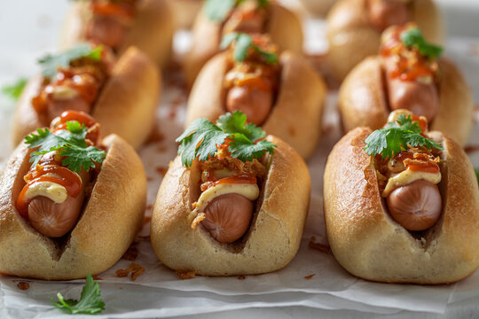 Spicy and delicious mini hot dogs as quick appetizers.
