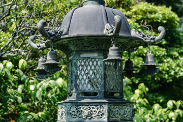 Stone lanterns in a traditional Japanese garden