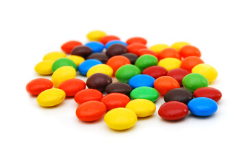 Closeup of colorful chocolate candies on white