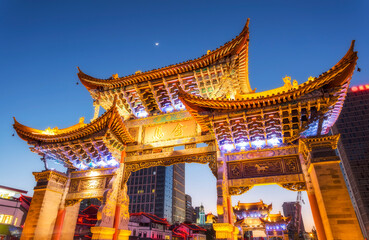 Fototapeta premium Night view of the Golden Horse and Jade Chicken Site in Kunming