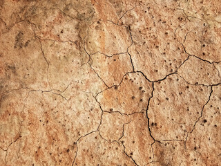 The ground has cracks in the top view for the background