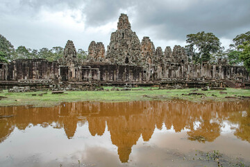 Fototapeta na wymiar Bayon, a sandstone castle with two hundred and sixteen faces carved in Siem Reap, Cambodia.