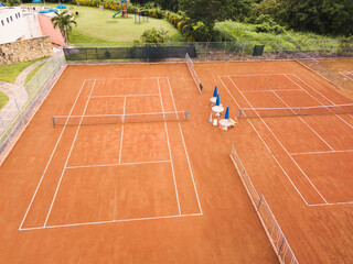 Aerial photo of empty clay tennis court. Concept of sport and background.