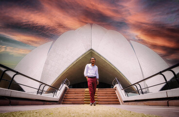 indian young man with lotus temple india