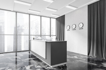 Reception interior desk with computer and clocks, panoramic window