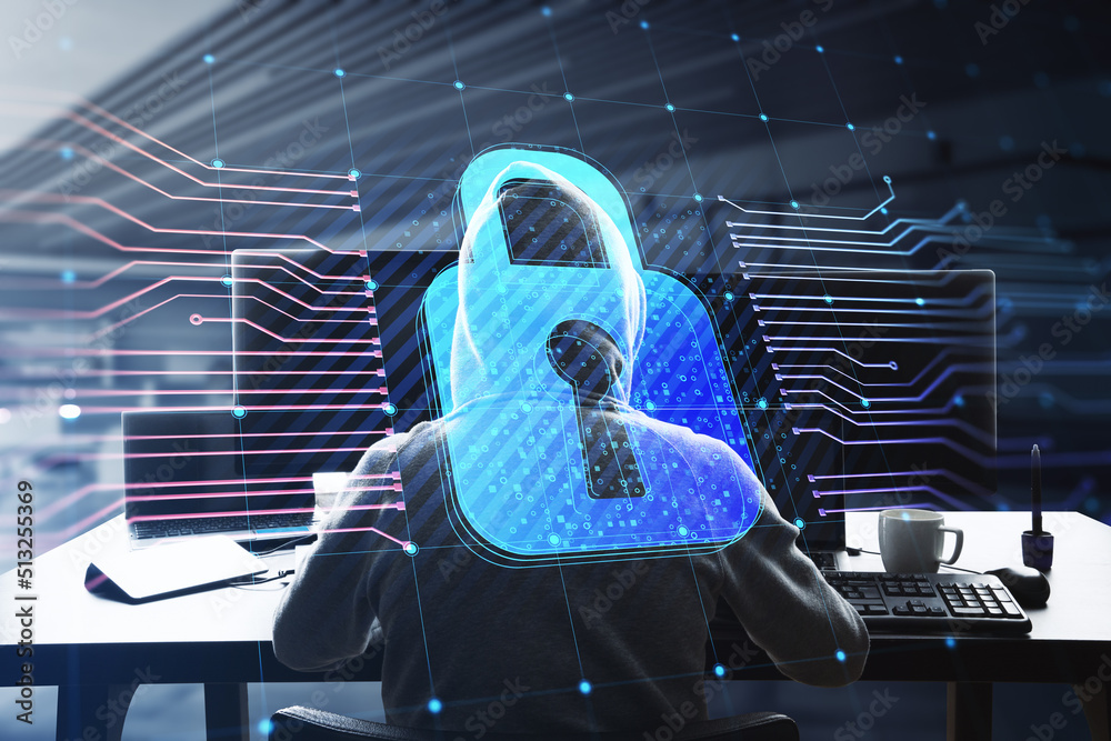 Poster Back view of hacker at desktop using computers with glowing padlock hologram and lines on blurry office interior background. Secure, hacking, safety and protection concept. Double exposure.